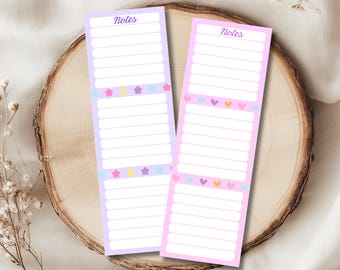 May include: Two printable note-taking bookmarks. One is lavender, the other is pink. Both have lined spaces for notes, with decorative flowers and hearts. The text at the top says "Notes". The text at the bottom says "4 Color Variations | Track Book Quotes, Page Numbers & Reading Notes".