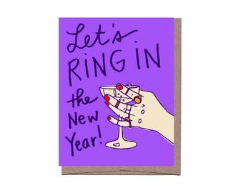 May include: Greeting card with a purple background and the text "Let's Ring in the New Year!". The illustration shows a hand holding a champagne glass. The hand has red nail polish and rings. The card is on a brown background.