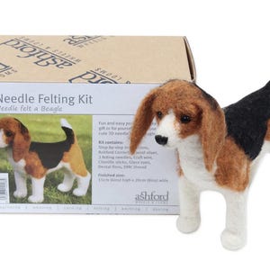 May include: A needle felting kit with a finished Beagle dog. The Beagle is white, black, and brown. The kit includes instructions, wool sliver, needles, craft wire, chenille sticks, glass eyes, and dental floss. The finished size is 6 inches high and 8 inches wide.