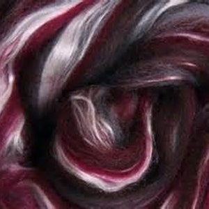 May include: A bundle of burgundy, white, and gray merino wool roving. The roving is soft and fluffy, perfect for spinning or felting.