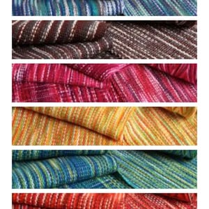 May include: A stack of six colorful striped woven throw blankets in teal, brown, pink, yellow, blue, and red.