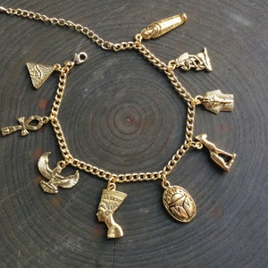 Egyptian Charm bracelet, Scarab, Ankh, Goddess Gold charms