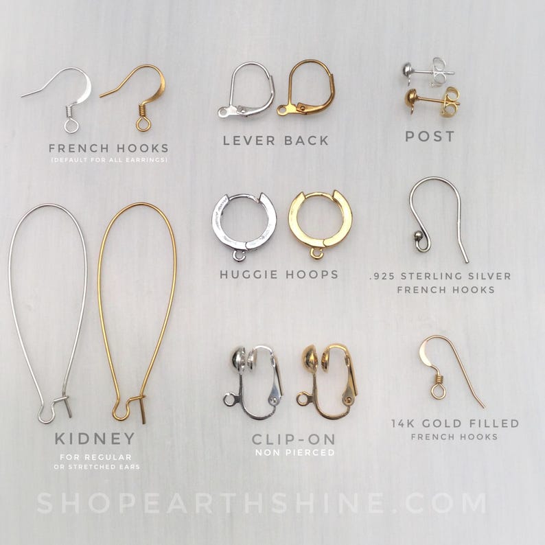 May include: Assortment of earring findings in silver and gold tones, including French hooks, lever backs, posts, huggie hoops, kidney wires, and clip-on styles. Text reads "French Hooks," "Lever Back," "Post," "Huggie Hoops," "Kidney," "Clip-On," and "14K Gold Filled French Hooks."