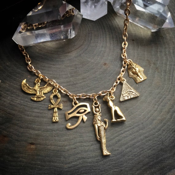 Egyptian necklace, Eye of Ra, Winged Goddess Pyramid, Bastet, gold charm necklace