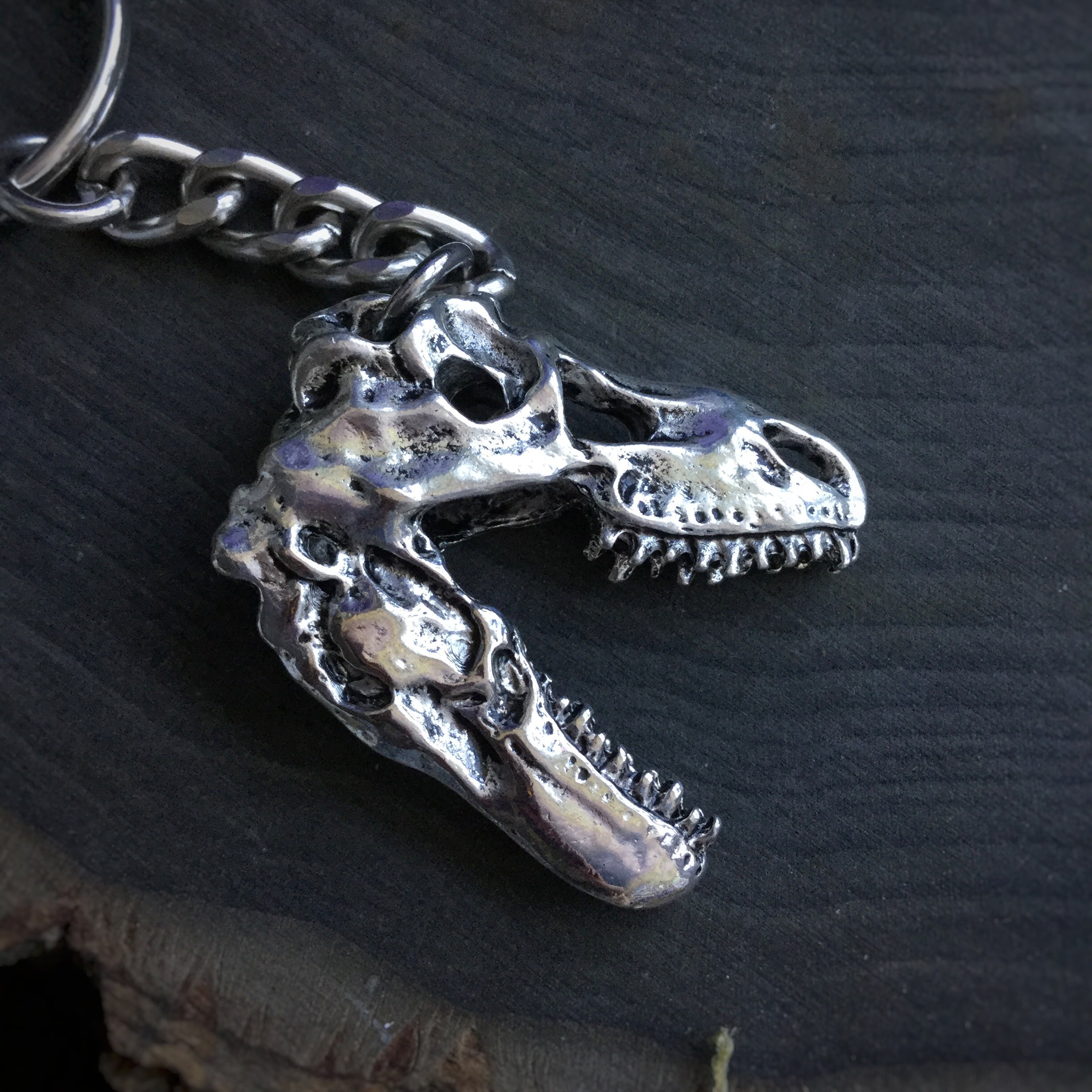 T REX DINOSAUR FOSSIL IMAGE CHROME POLISHED KEYRING PEAR STYLE SHAPE T REX DINOSAUR FOSSIL IMAGE CHROME POLISHED KEYRING PEAR STYLE SHAPE