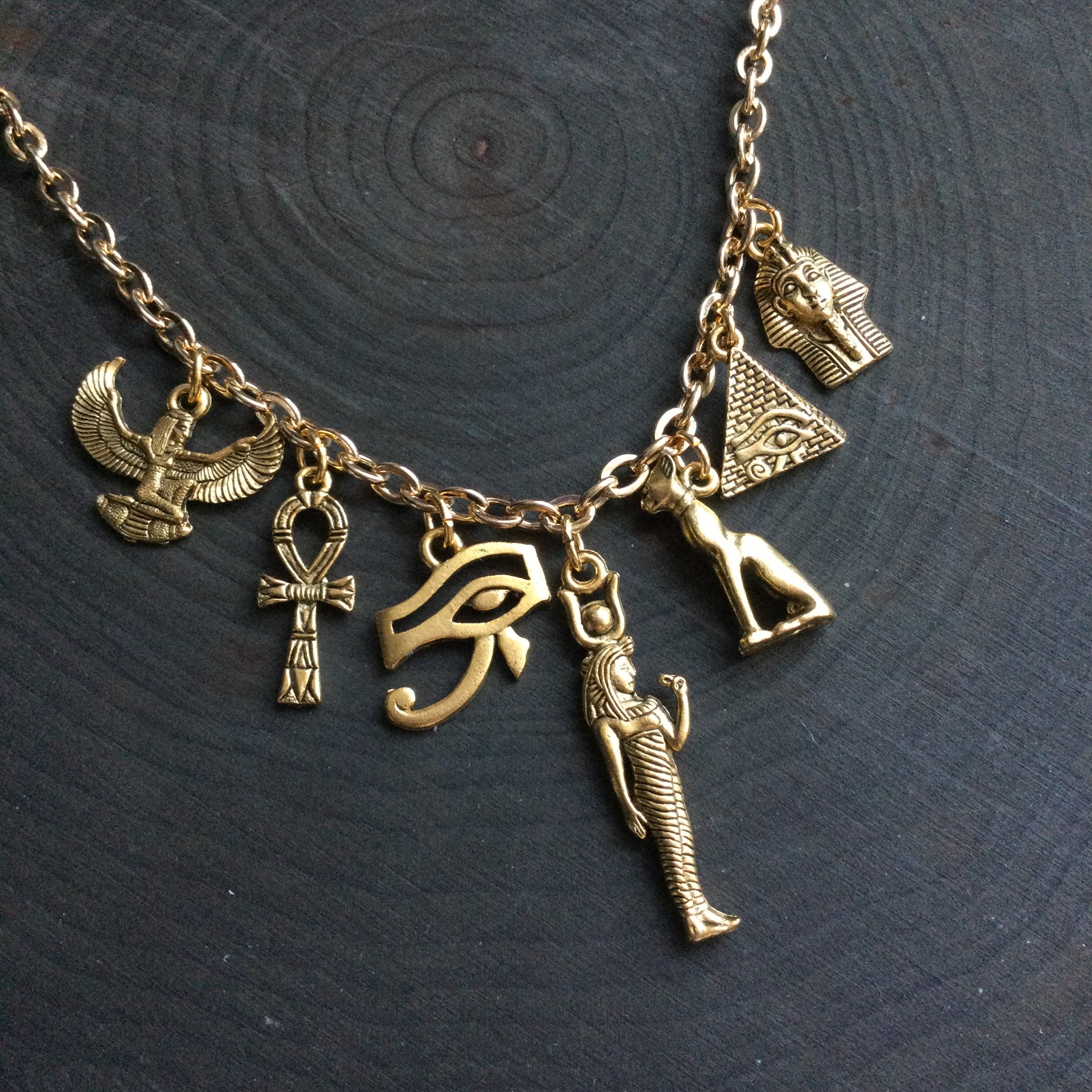 Gold Egyptian Necklace Eye of Ra Winged Goddess Pyramid Bastet 24k Plated Charm Necklace Etsy