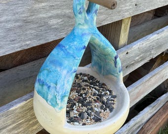Slip cast and hand painted ceramic stoneware pottery bird feeder. Unique ocean beach design. Great gift!