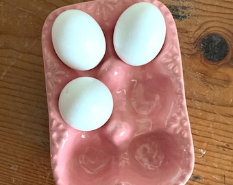 Slip cast hand painted stoneware ceramic pottery farmhouse egg plate, crate, storage, holder with pink glaze. Great for backyard chickens
