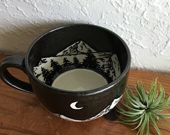 Wheel thrown and hand painted ceramic pottery mug or cup for tea, coffee, soup, cappuccino. Inside outside tree and mountains design