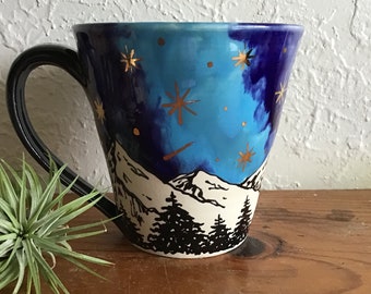 Wheel thrown and hand painted ceramic pottery mug or cup for tea or coffee. Trees, mountains, space galaxy Milky Way w/ metallic gold stars