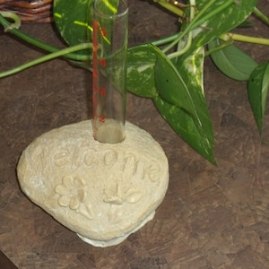 Rock rain gauge-garden statuary