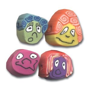 May include: Four colorful clay beads with different facial expressions. Each bead has a unique hairstyle and features a different color scheme.