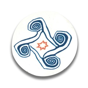 May include: A white circular sticker with a blue and white abstract design. The design features four swirling shapes with a central orange star.