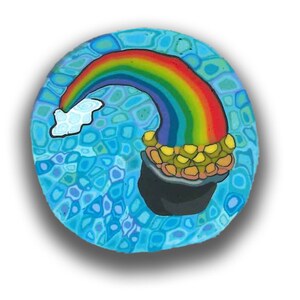 May include: A rainbow with a cloud at the top, ending in a pot of gold on a blue background with a swirling pattern.