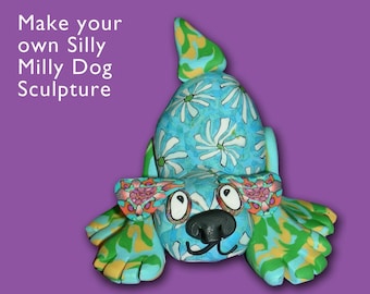 May include: A whimsical, blue, green, and yellow clay sculpture of a dog with a daisy pattern on its back. The dog has large, round eyes and a playful expression. The sculpture is titled "Make your own Silly Milly Dog Sculpture".