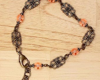 Victorian style handmade chain link bracelet with Czech Peach Druk Glass Beads and Antiqued Brass Metals Adjustable Size