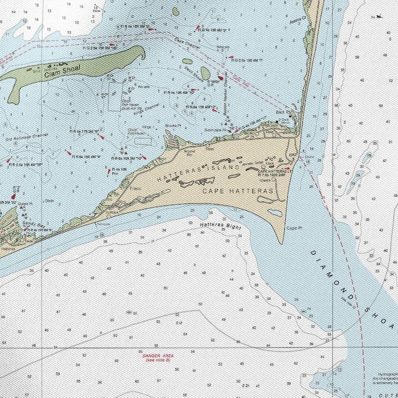 May include: A nautical chart of Cape Hatteras, North Carolina, with detailed information on depths, shoals, and navigational aids. The chart features the names of landmarks such as Hatteras Island and Diamond Shoal, with a light blue and white color scheme.