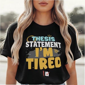 May include: A white ceramic mug with a black handle and the text "But First, Coffee" in a black, bold font. The mug is likely 4 inches tall and holds approximately 12 ounces of liquid.