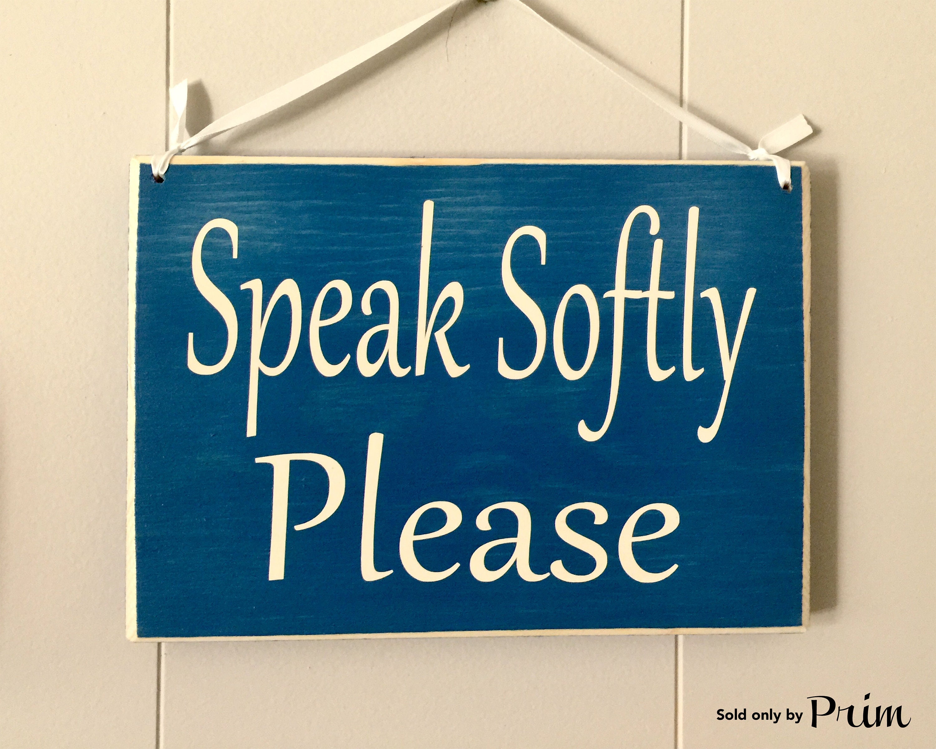 Quietly spoken. Quiet please. Speak quietly.