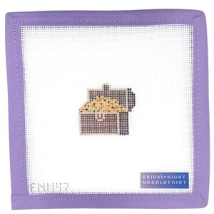 May include: Needlepoint canvas with a treasure chest design. The canvas is square, with a white center and a lavender border. The treasure chest is brown, filled with gold coins. The text "FRIDAY NIGHT NEEDLEPOINT" is in a blue rectangle.