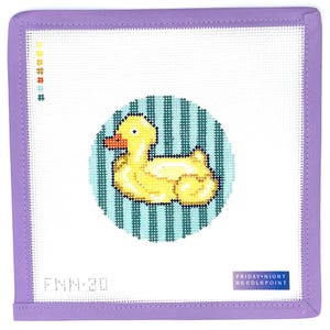 May include: Needlepoint canvas featuring a yellow duck design within a blue striped circle. The canvas has a white background with a lavender border. The text "FNN-20" is visible, along with the "FRIDAY NIGHT NEEDLEPOINT" logo.