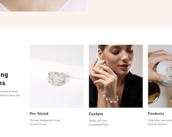 May include: A website homepage showcasing a variety of jewelry collections, including pre-styled engagement rings, custom designed rings, and pendants. The website features images of the jewelry and text describing each collection.