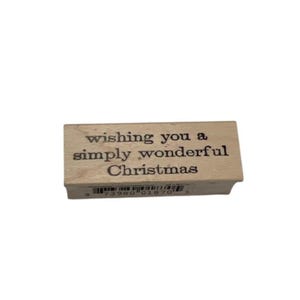 Tarjeta con sello de goma y álbum de recortes de Memory Box "Deseándote una maravillosa Navidad"