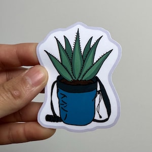 Plante d'aloe vera dans un sac de craie d'escalade, autocollant en vinyle résistant à l'eau, laminé brillant, découpé avec des matrices
