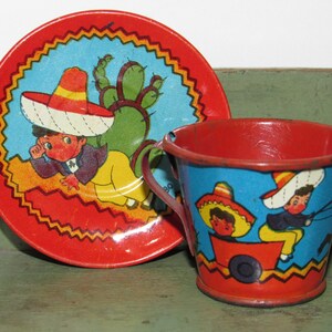 1940's Ohio Art Company "Mexican Boys" Tin Toy Tea Cup And Saucer