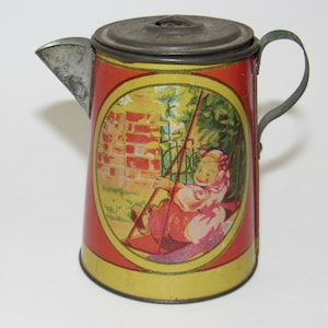 1920 Ohio Art Girl On A Swing Tin Toy Tea Pot