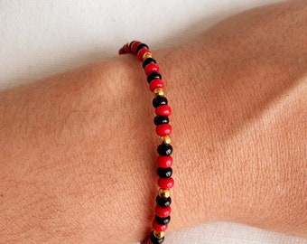 Red Bracelet w/ Black Beads – Fulton Cultural & Spiritual