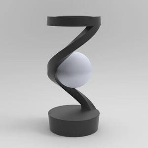 Peut inclure: Une lampe de table noire dotée d'une base circulaire et d'un sommet circulaire assorti, reliés par un bras central en spirale en forme de S. Un globe lumineux sphérique blanc et lisse est placé au centre de la spirale, entre les courbes.