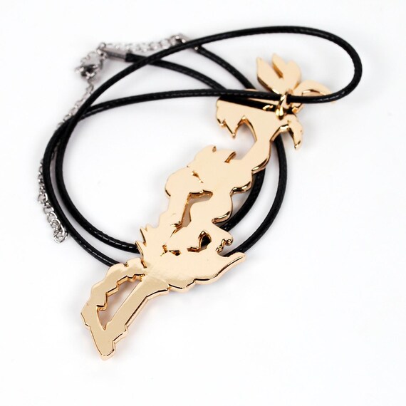 Nia Catalyst Scimitar Blade Enamel Metal as Necklace Keychain or