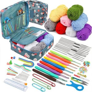 May include: A complete crochet kit with a floral patterned storage bag, various colored yarn balls, and a variety of crochet hooks with colorful handles. The kit includes scissors, stitch markers, and other essential tools for crocheting.
