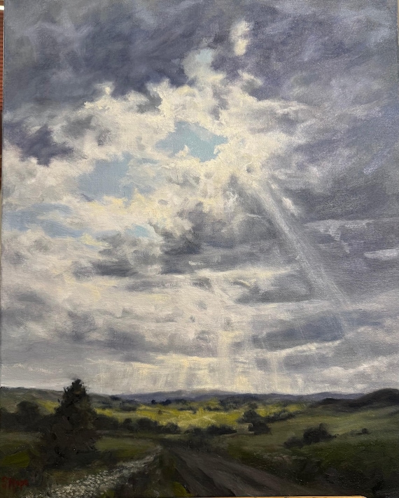 Sunbreak Through Storm Clouds.