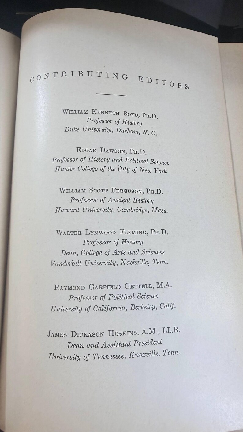 May include: A book page featuring a list of "Contributing Editors". The text, in black, details the names and academic affiliations of several professors. The background is off-white. Universities include Duke and Cambridge.
