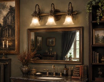 Aplique de pared vintage de 2004 en tono bronce con 3 luces y diseño gótico de hojas.