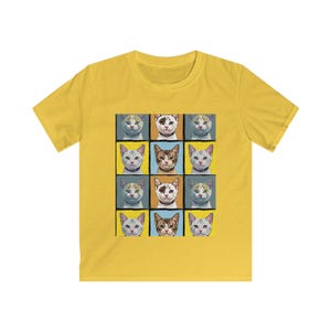 May include: A yellow t-shirt with a graphic of nine cats in a grid pattern. Each cat has a different color and pattern. The cats are all looking at the camera.