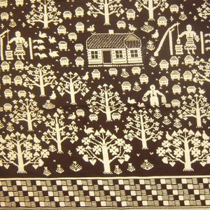 May include: A brown and white woven textile with a repeating pattern of houses, trees, and birds. The pattern is reminiscent of a folk art design.