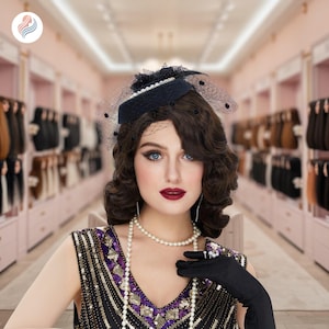 May include: A woman wearing a black hat with a veil, pearl necklace, and black gloves. The hat is adorned with pearls and a net veil. The woman is wearing a black and gold sequined dress. The background shows a hair salon with various hair extensions.