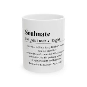 May include: White ceramic mug with black text that reads "Soulmate {sol-māt} noun &bull; English your other half in a fuzzy blanket, someone you feel incredibly comfortable and connected with, like a perfect match that just fits perfectly with you, bringing warmth and happiness. Destined to be together AKA: YOU"