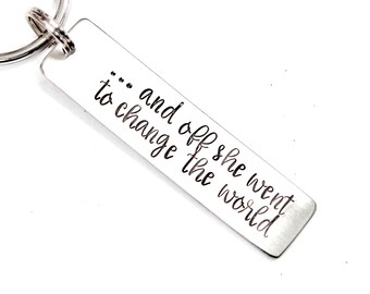 And off she went to change the world keychain - Available in Aluminum and Stainless Steel