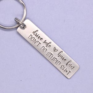 Drive safe have fun don't do stupid sh*t - Hand Stamped Keychain