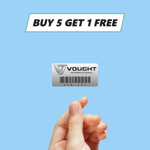May include: A silver sticker with the text "Vought International" and a barcode. The sticker has the text "BUY 5 GET 1 FREE" above it.