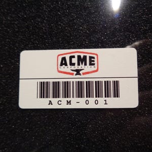 ACME Corporation-itemtag vinyl sticker / label / envelop / badge / logo 2 x 1 in [845]