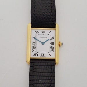 Vintage Cartier tankpolshorloge — 18k goud, heren, werkend