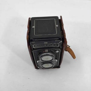 Fotocamera a pellicola Rolleiflex Automat vintage NON TESTATA con custodia
