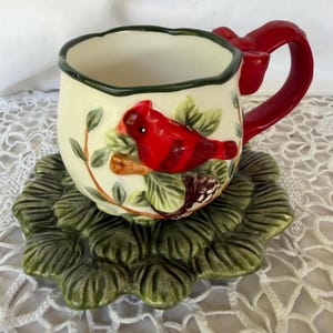 Corner Ruby Holiday cardinal mug and saucer.