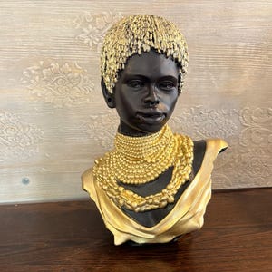 African Woman Bust Statue: Black & Gold Polyester Sculpture
