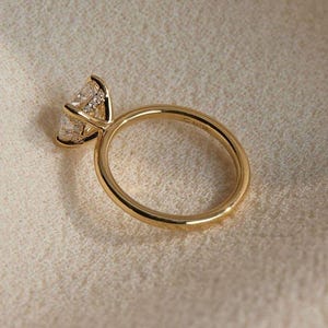 Cushion Cut Moissanite Engagement Ring: 14k Yellow Gold Hidden Halo